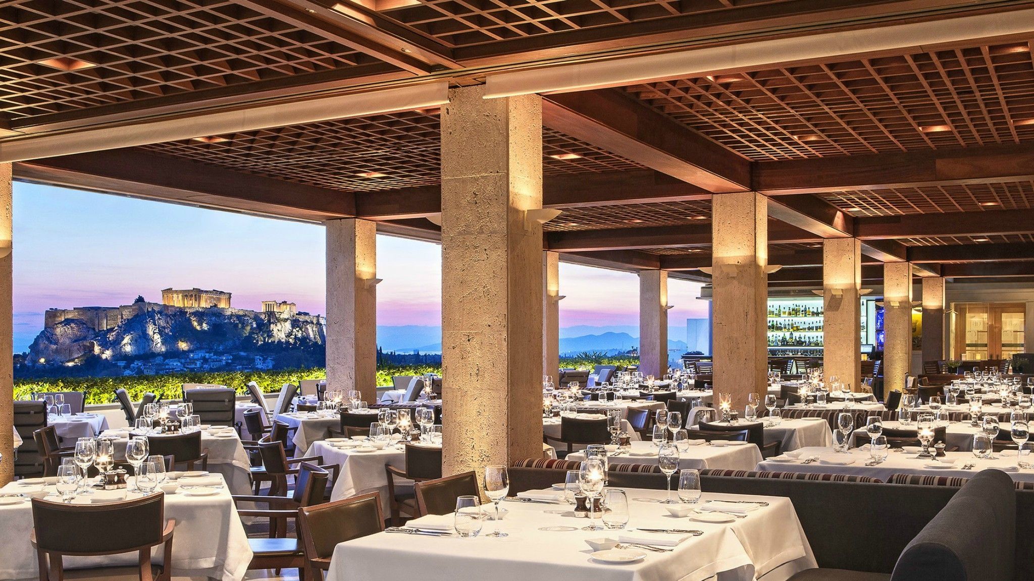 Romantic dinner at the GB Roof Garden Restaurant in the heart of Athens with amazing views to the Acropolis.